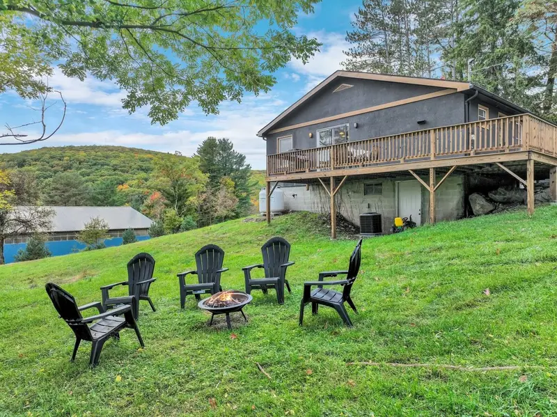 Fire pit with Adirondack chairs