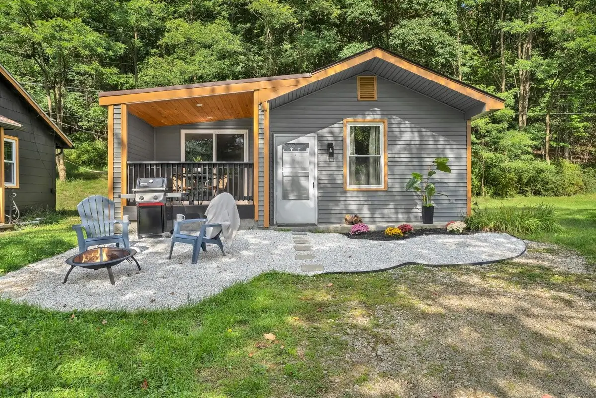 Modern rustic charm surrounded by nature’s serene backdrop. Welcome home to total peace.