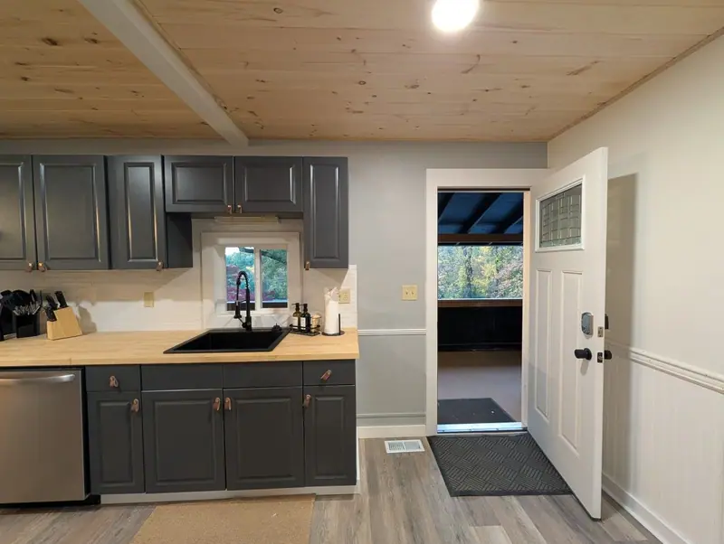 Pour your coffee by the window, then step right out the door to the covered porch.