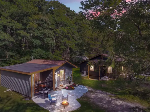 Tucked away beneath the canopy, where sunset hues meet the quiet comfort of your private fireside retreat.